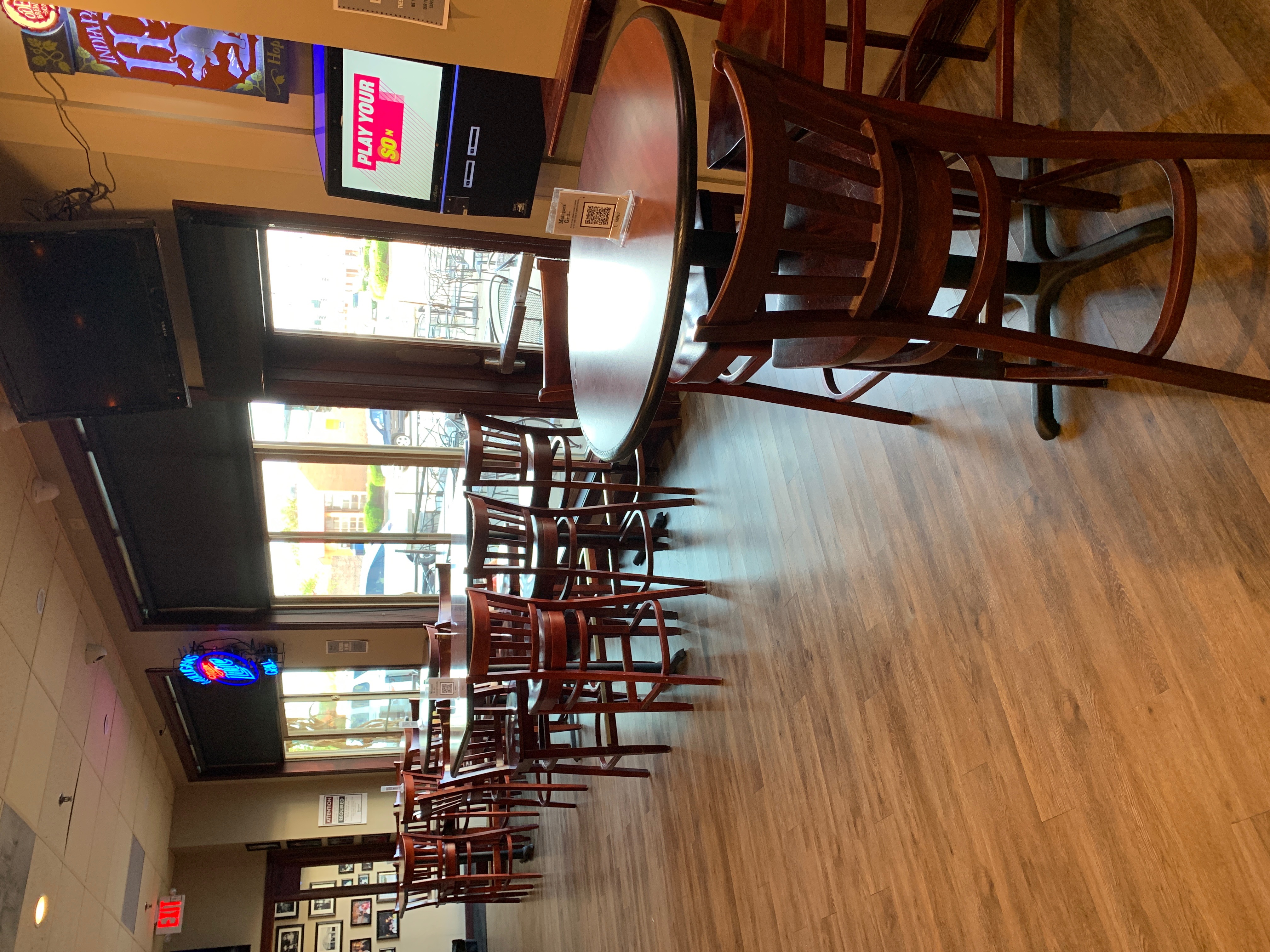 Dining tables by the windows at Mulligan's Grill